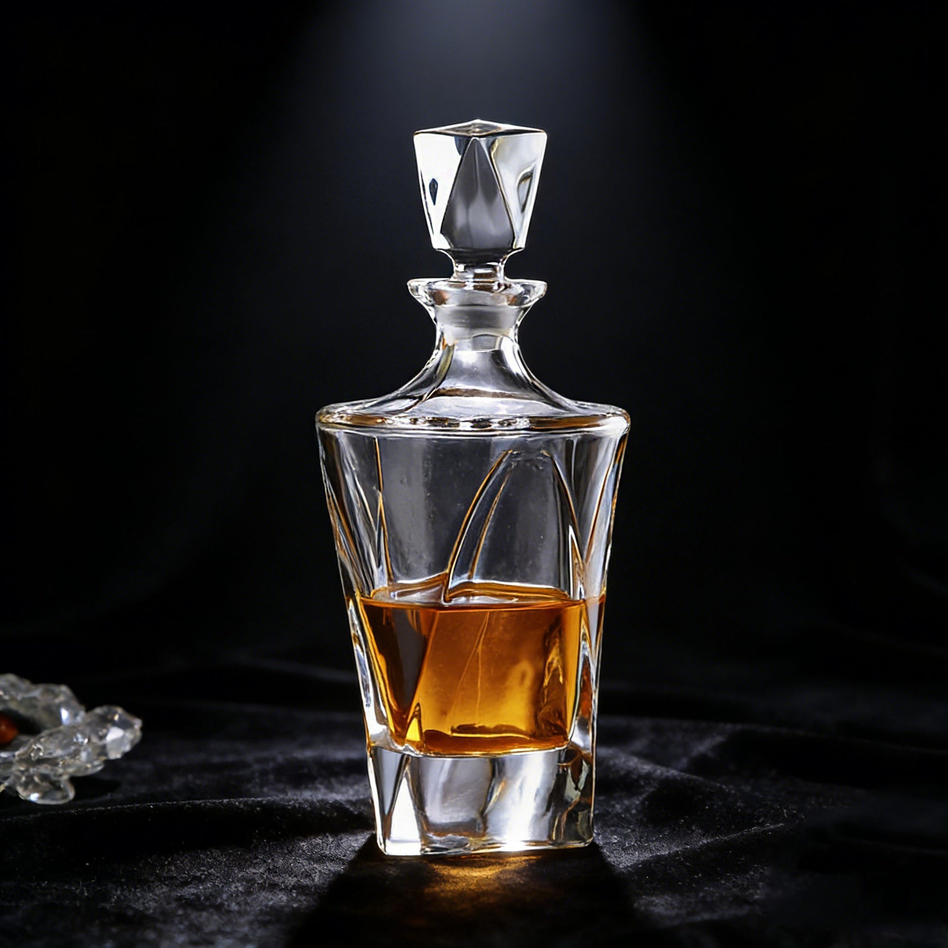 Glass whiskey decanter with a dark background