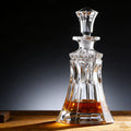 Crystal whiskey decanter with a dark background